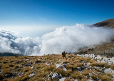 Hiking above the clouds in the mountains of Dukat, Albania.