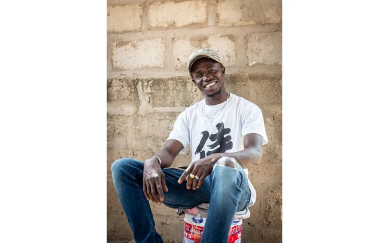 Smiling young Gambian man
